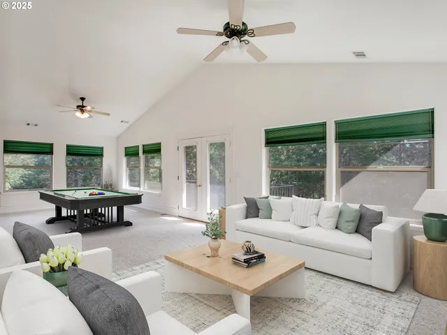 view of house with outdoor space and garden