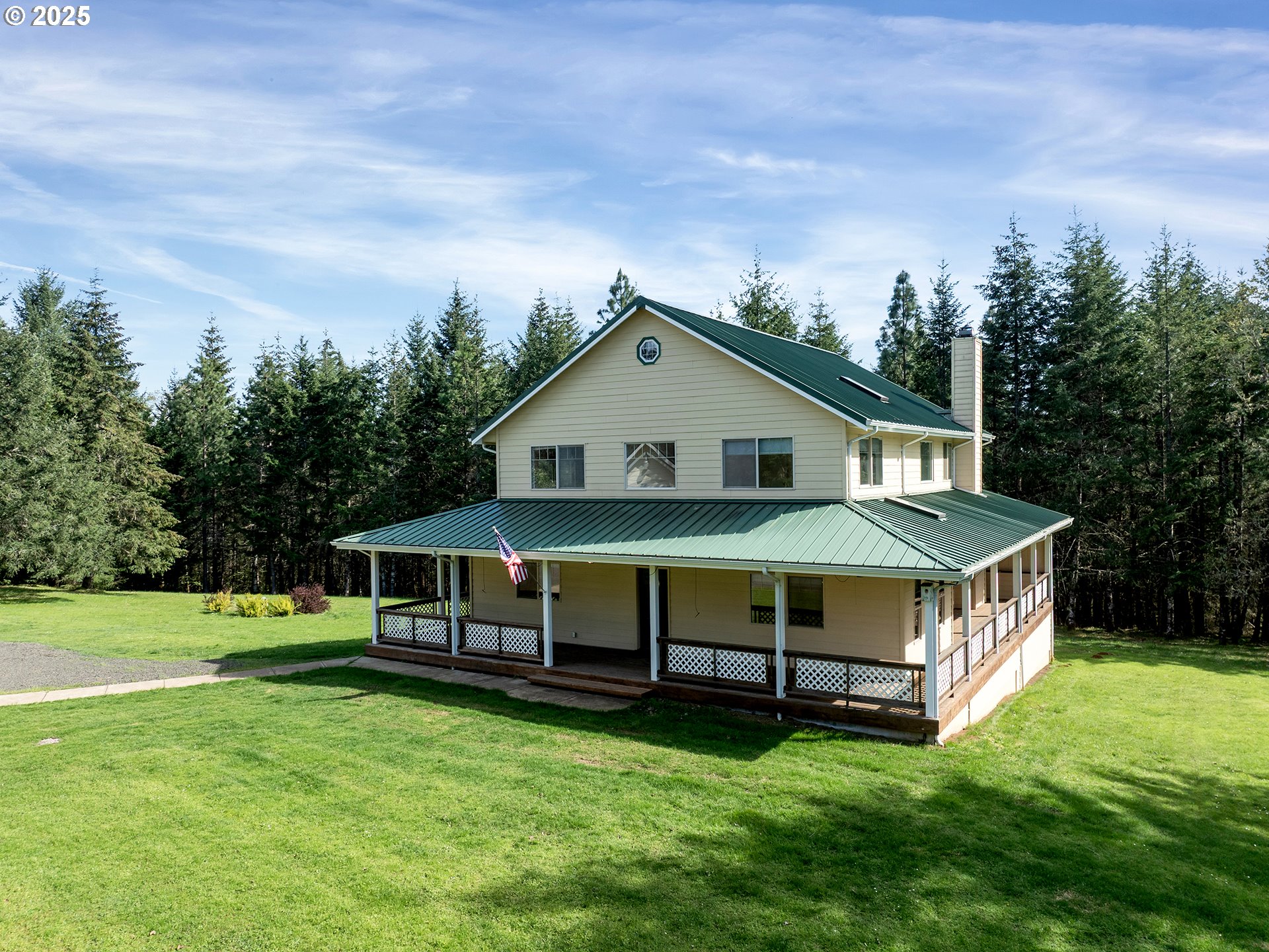 17234 Oakdale Road Dallas, OR 97338 - Photo 35 of 45 a aerial view of a house with a big yard and large trees