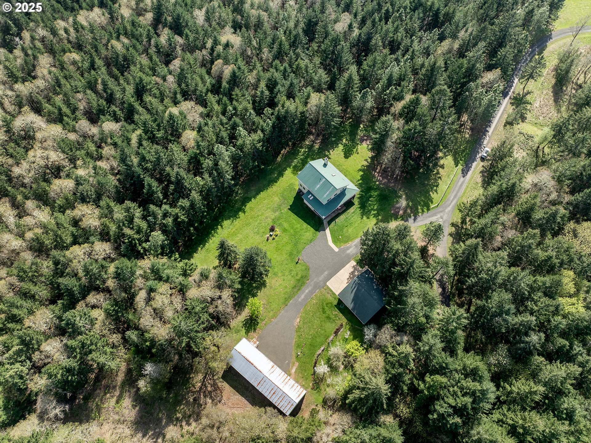 17234 Oakdale Road Dallas, OR 97338 - Photo 36 of 45 an aerial view of a house with a yard and outdoor seating