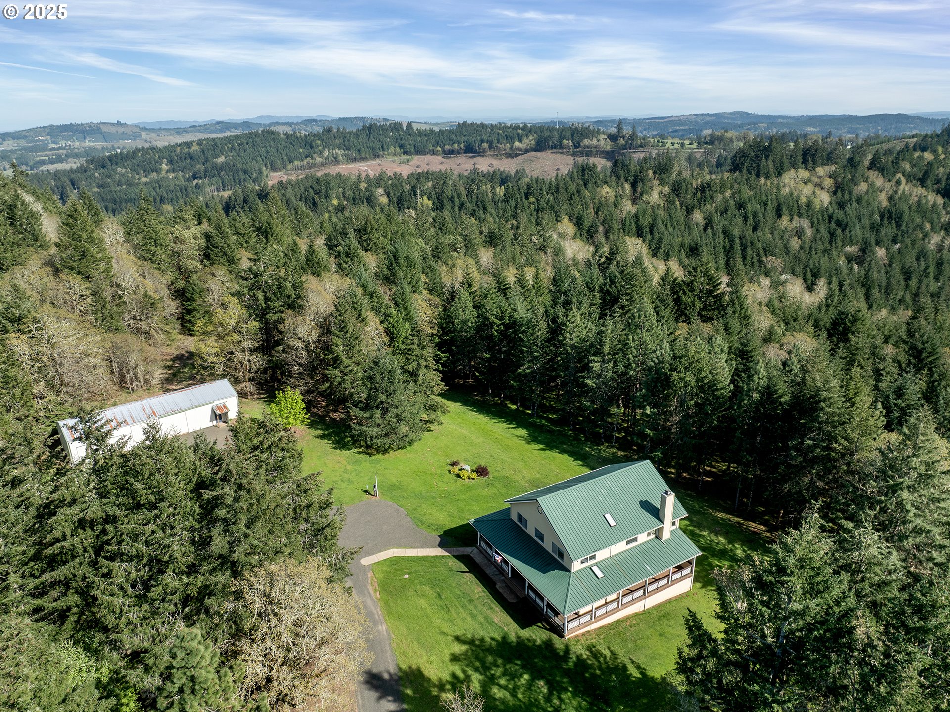 17234 Oakdale Road Dallas, OR 97338 - Photo 39 of 45 an aerial view of a house with a yard
