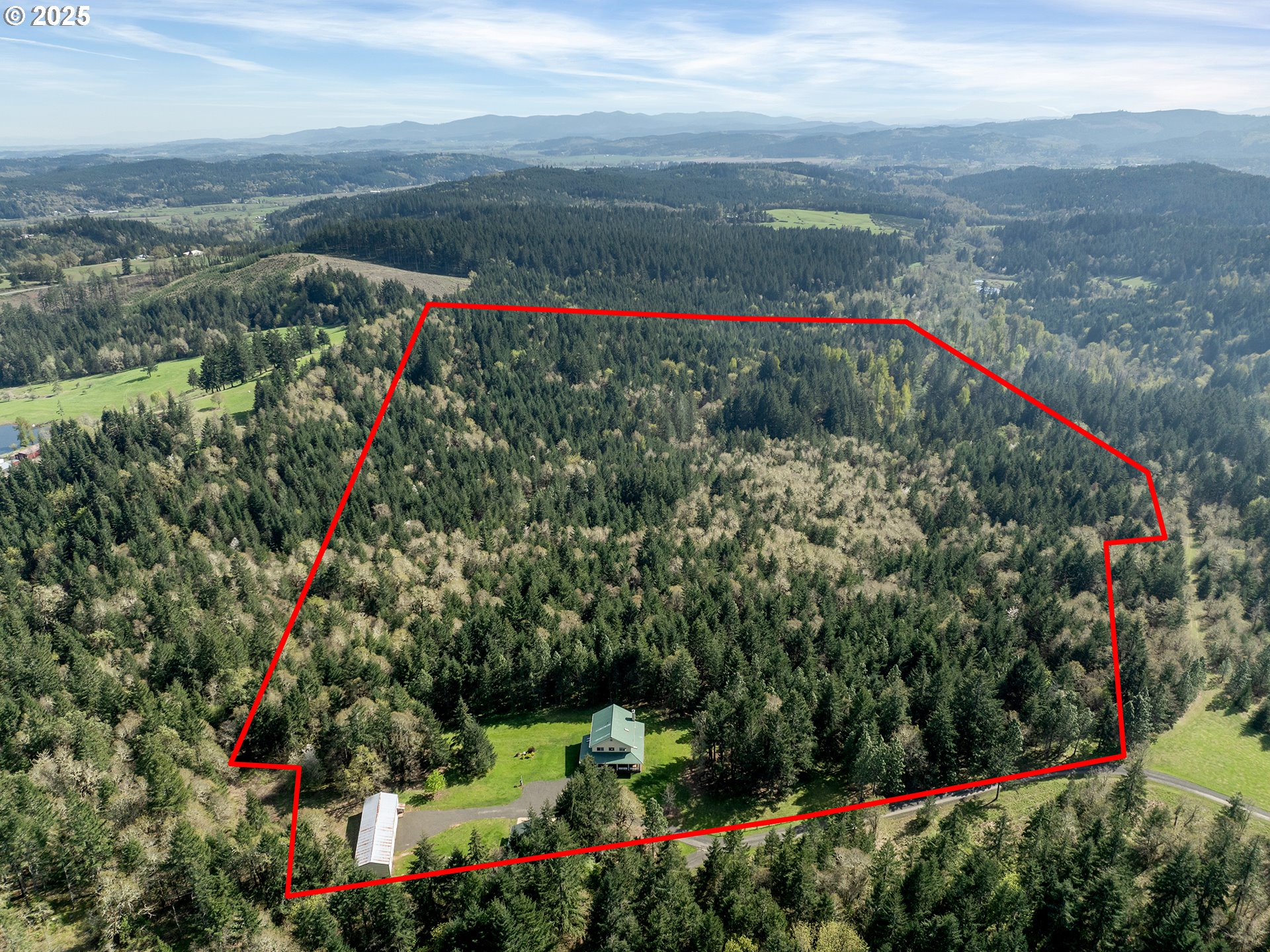 17234 Oakdale Road Dallas, OR 97338 - Photo 4 of 45 a view of a pathway with a flower garden