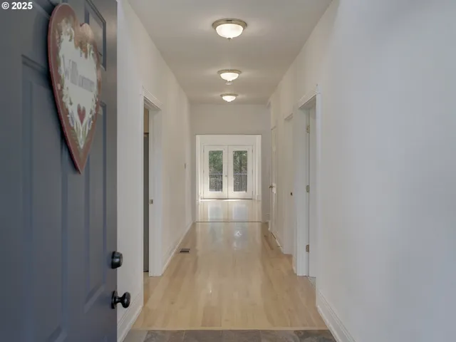 a view of entryway with wooden floor