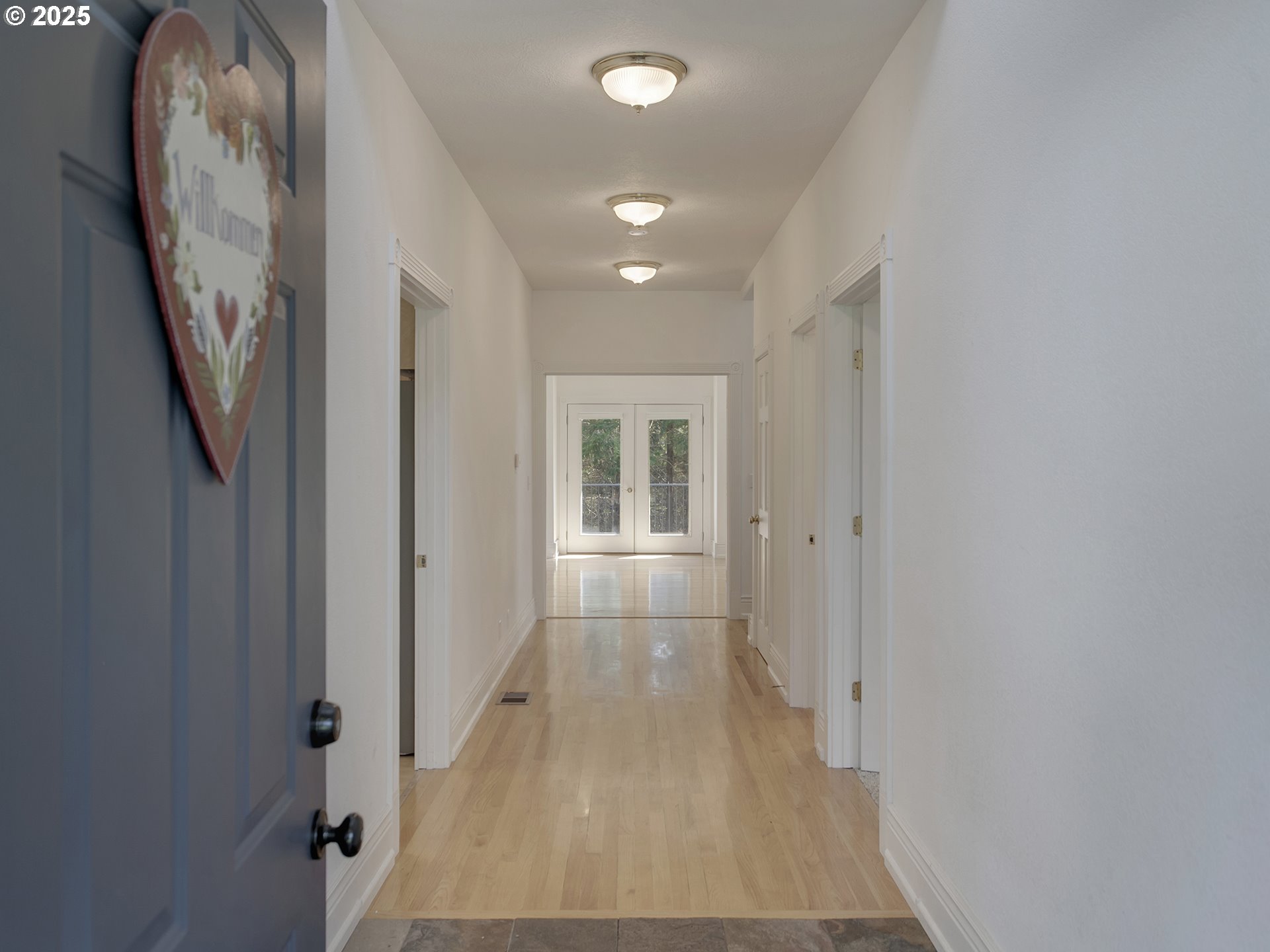 17234 Oakdale Road Dallas, OR 97338 - Photo 6 of 45 a view of entryway with wooden floor