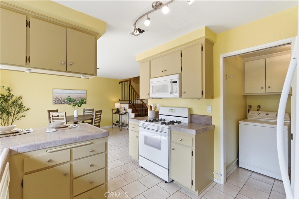 5021 Vauxhall Road Westminster, CA 92683 - Photo 10 of 38 Kitchen, Laundry Room, and Dining Room/Dining Area