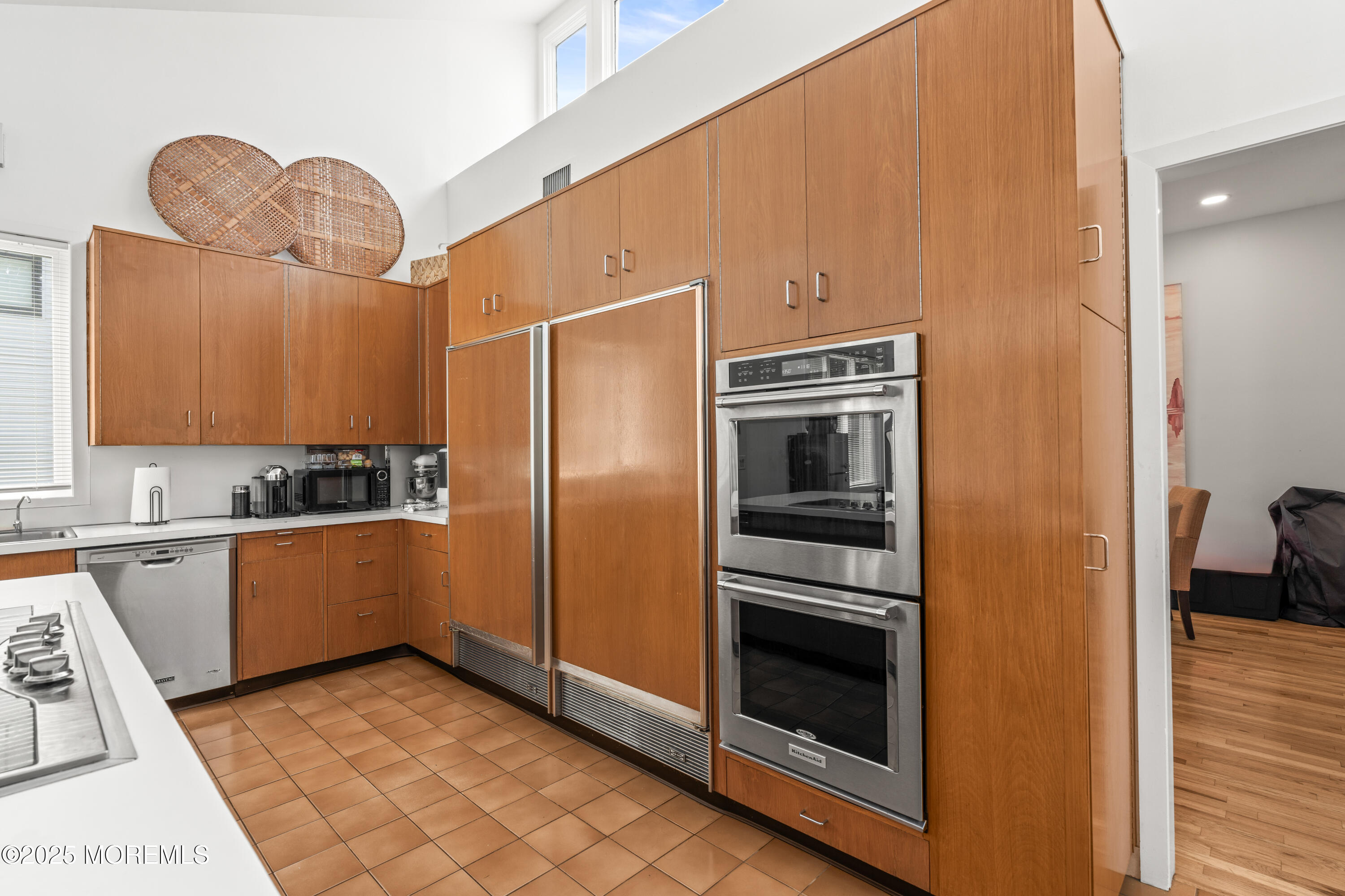 460 Runyan Avenue Deal, NJ 07723 - Photo 12 of 30 a kitchen with granite countertop a refrigerator and a stove top oven