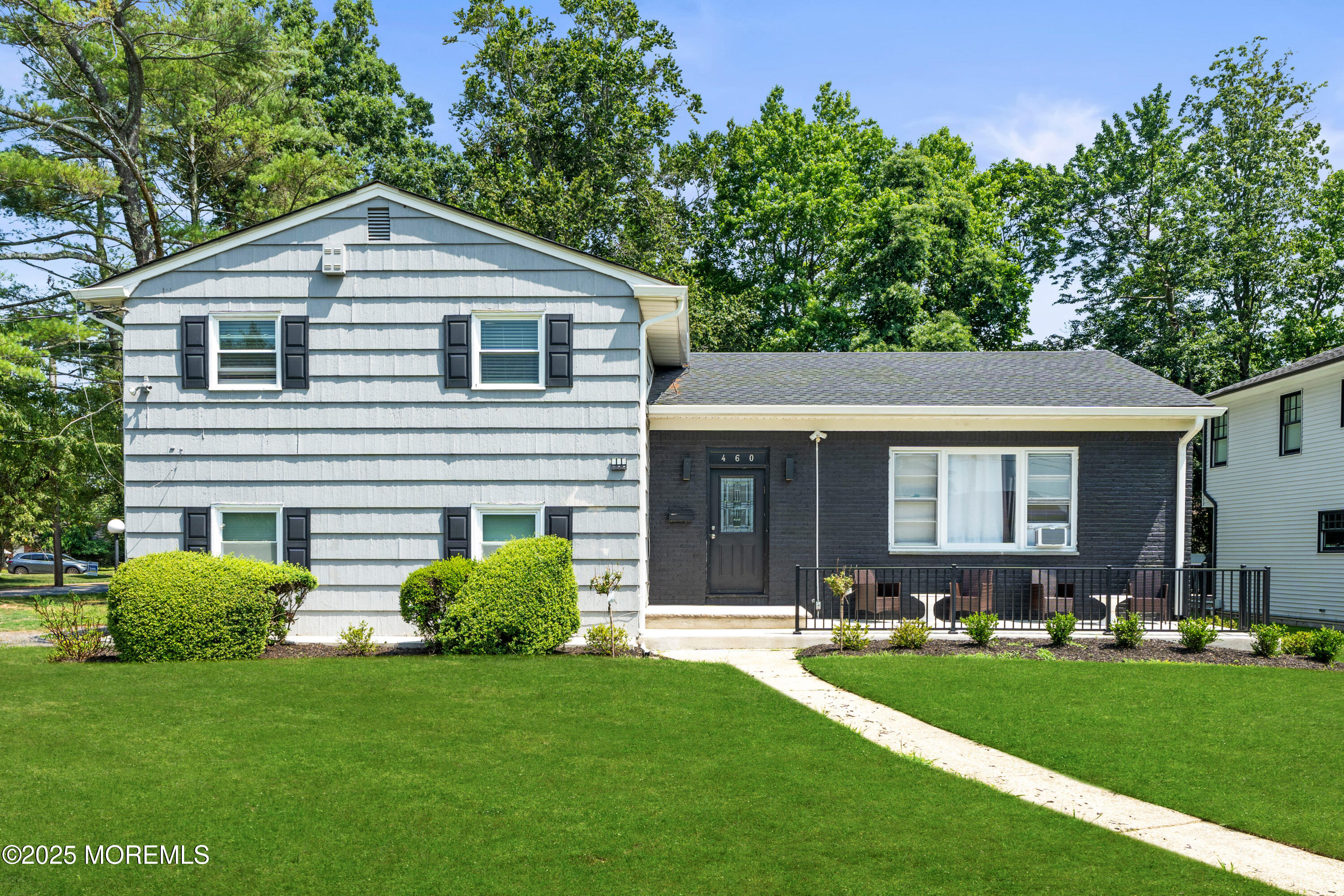 460 Runyan Avenue Deal, NJ 07723 - Photo 4 of 30 a front view of house with yard and green space
