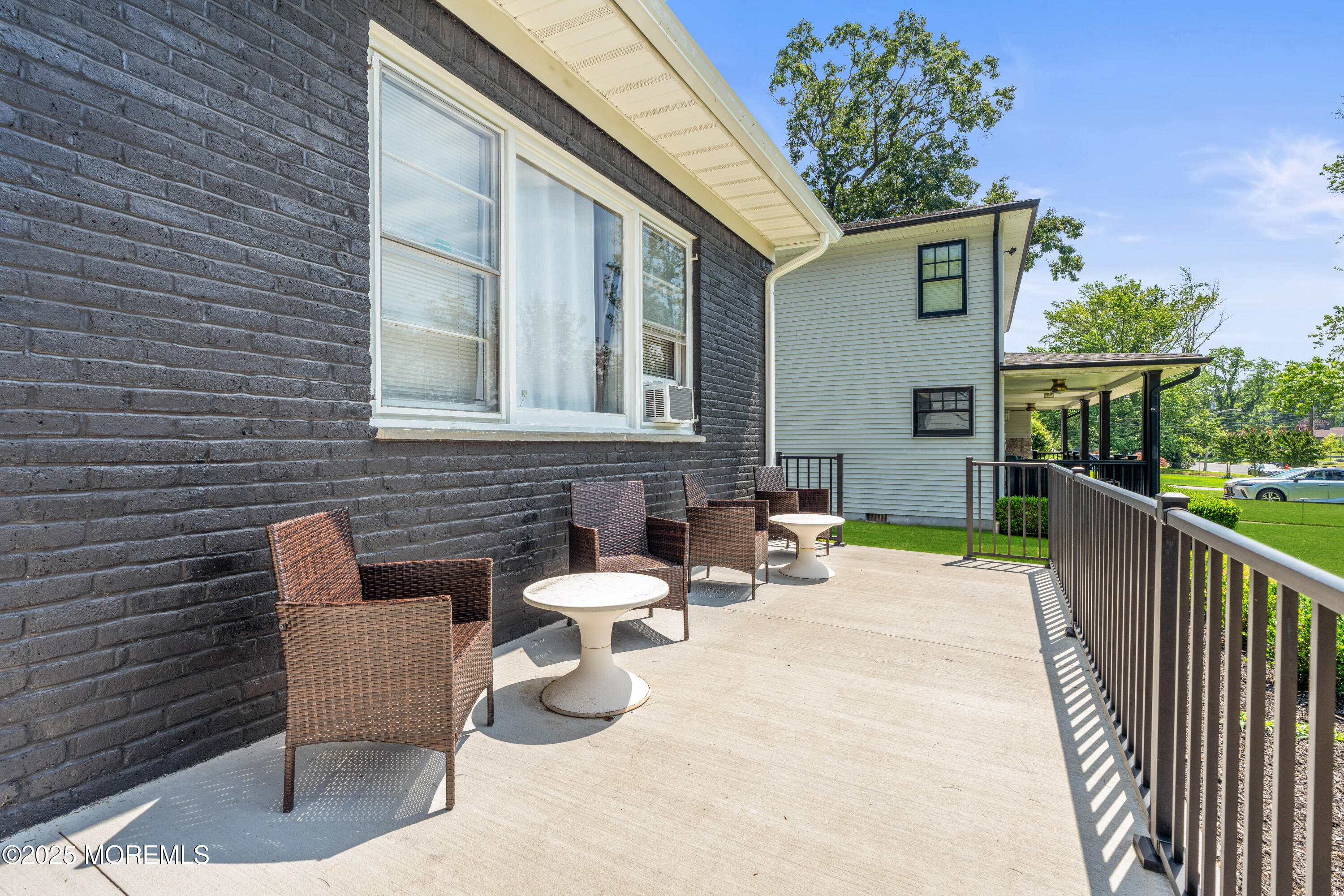 460 Runyan Avenue Deal, NJ 07723 - Photo 5 of 30 a view of a patio with couple of chairs and a couch