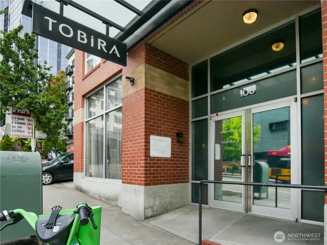 a view of a porch with potted plants