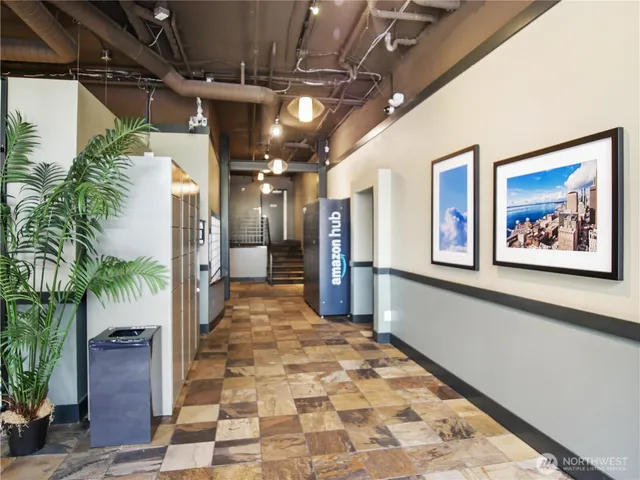 a view of gallery with a hallway