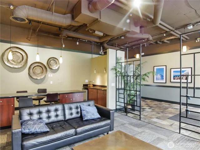 a living room with a couch and a stove