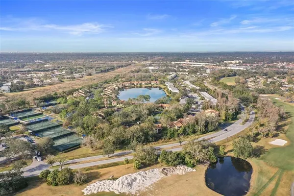an aerial view of residential building with parking space