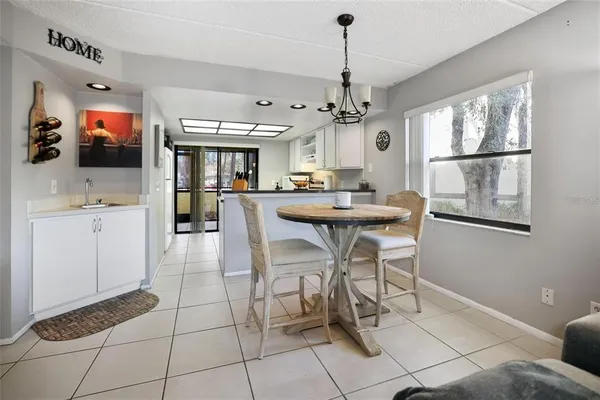 a view of a dining room kitchen and a window