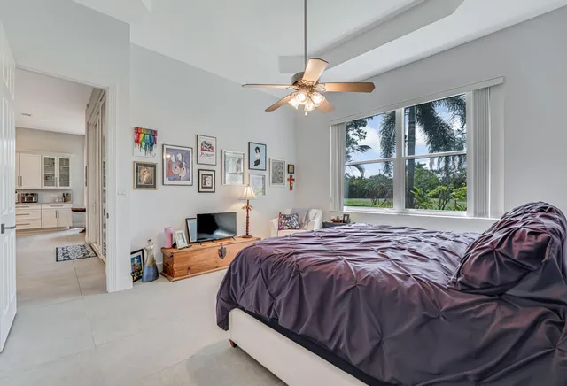 a bathroom with a sink vanity and mirror