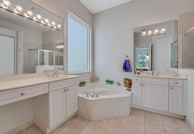 a bedroom with a bed and dresser