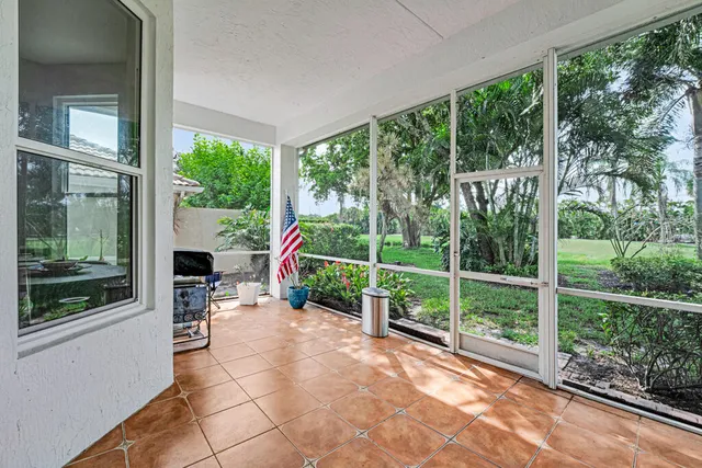 a front view of a house with a yard and porch