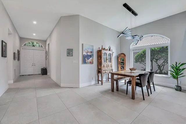 a living room with furniture fireplace and a flat screen tv
