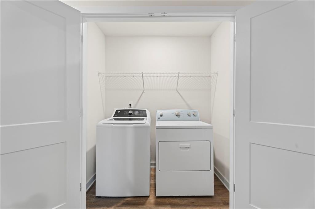 1149 Bluecoat Circle Hampton, GA 30228 - Photo 18 of 21 a utility room with dryer and washer