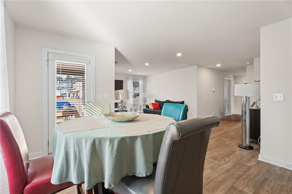 1149 Bluecoat Circle Hampton, GA 30228 - Photo 8 of 21 a view of a dining room with furniture