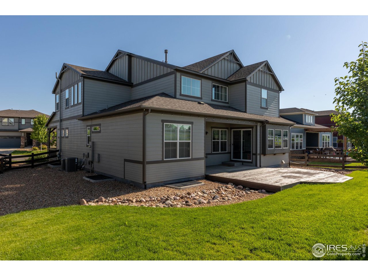 973 Stagecoach Drive Lafayette, CO 80026 - Photo 2 of 39 a view of a house with a yard and sitting area