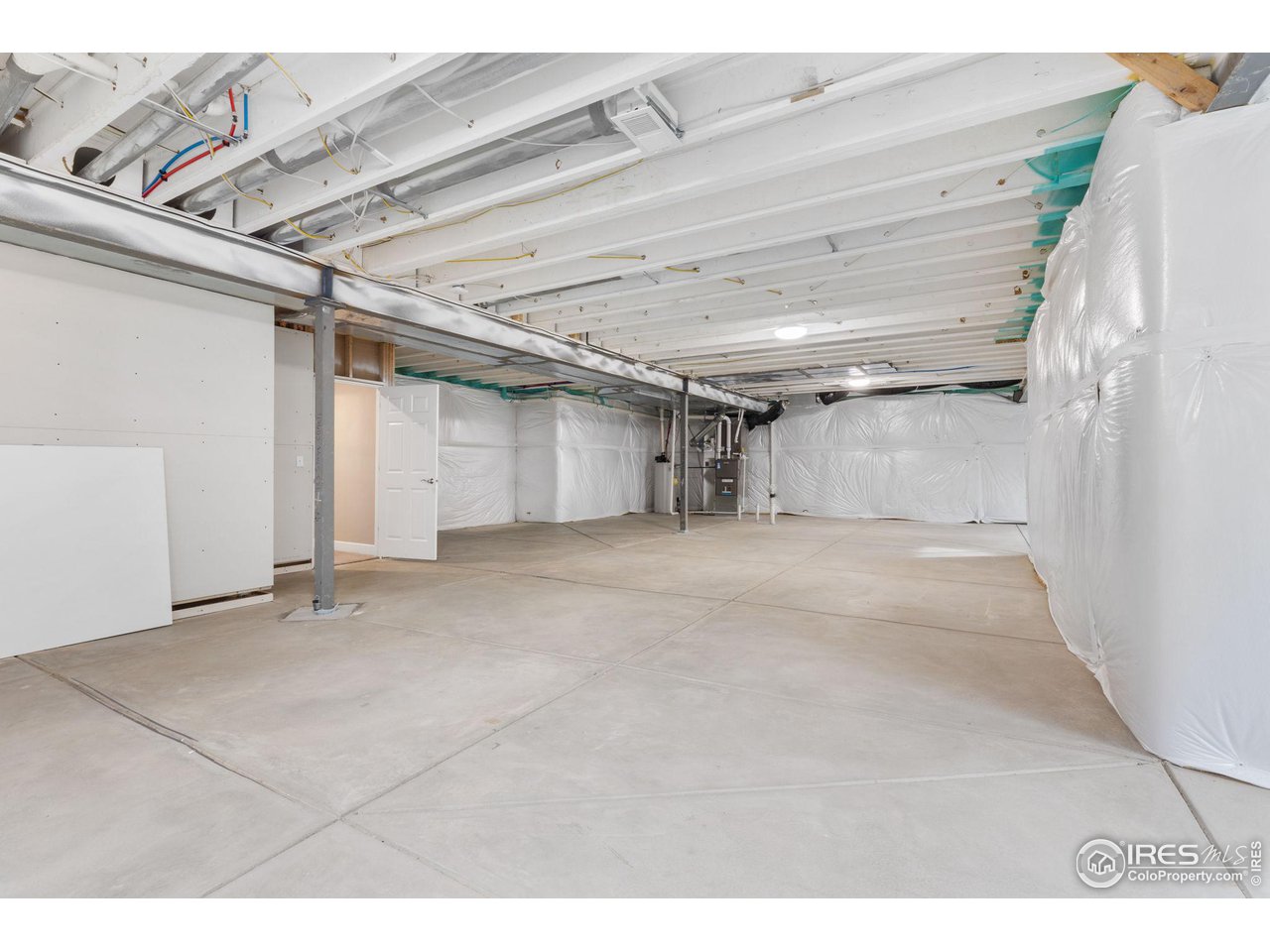 973 Stagecoach Drive Lafayette, CO 80026 - Photo 26 of 39 a view of a room with an empty space