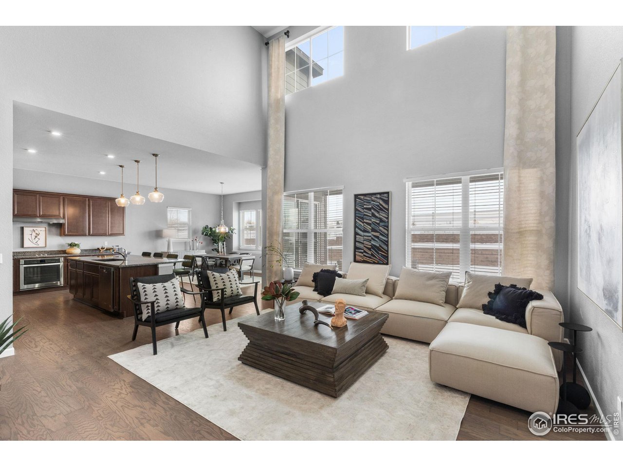 973 Stagecoach Drive Lafayette, CO 80026 - Photo 3 of 39 a living room with furniture and a large window