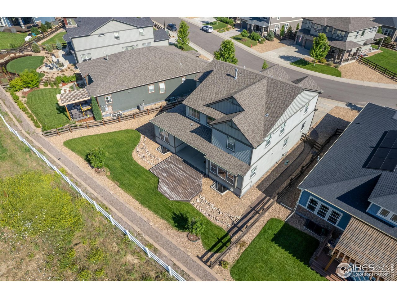 973 Stagecoach Drive Lafayette, CO 80026 - Photo 33 of 39 an aerial view of a house with a garden and swimming pool