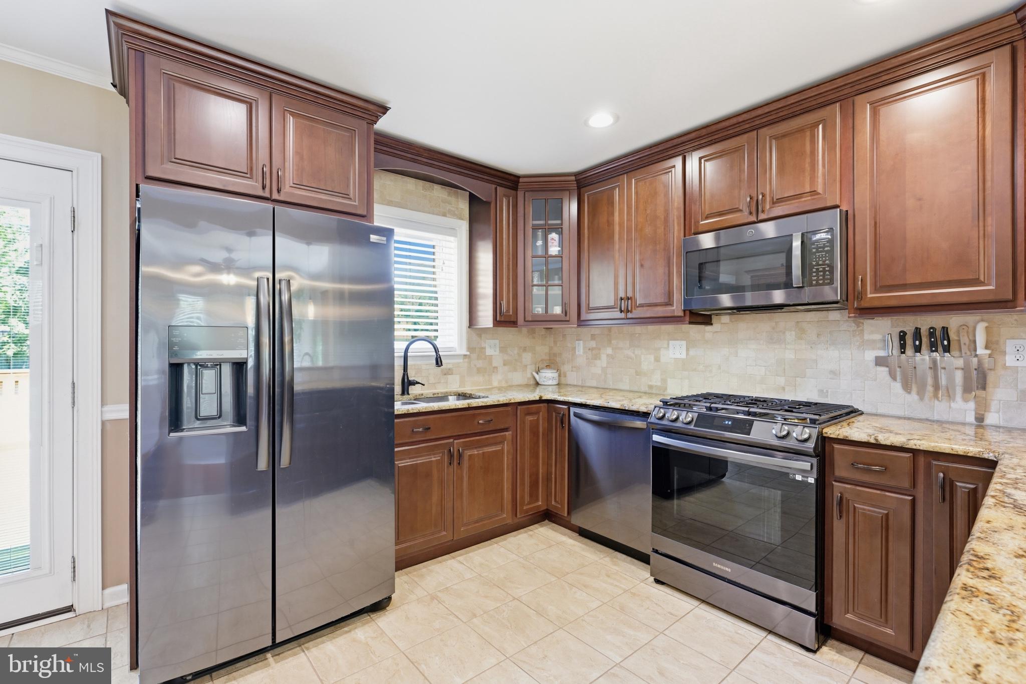 768 Salem Church Road Newark, DE 19702 - Photo 13 of 42 Modern kitchen with rich cabinetry.