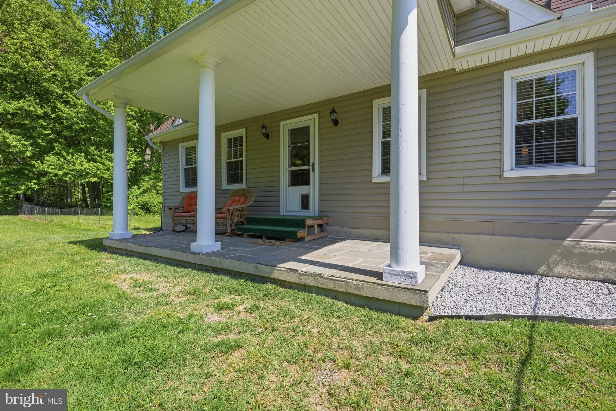 768 Salem Church Road Newark, DE 19702 - Photo 35 of 42 Charming porch with inviting greenery.