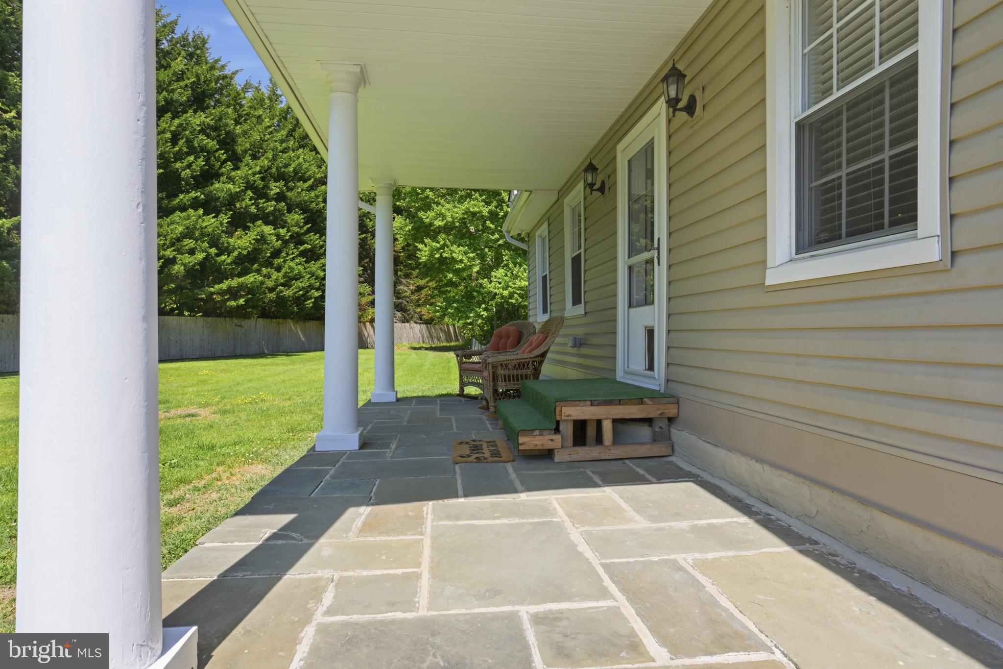 768 Salem Church Road Newark, DE 19702 - Photo 36 of 42 Charming porch with serene greenery.
