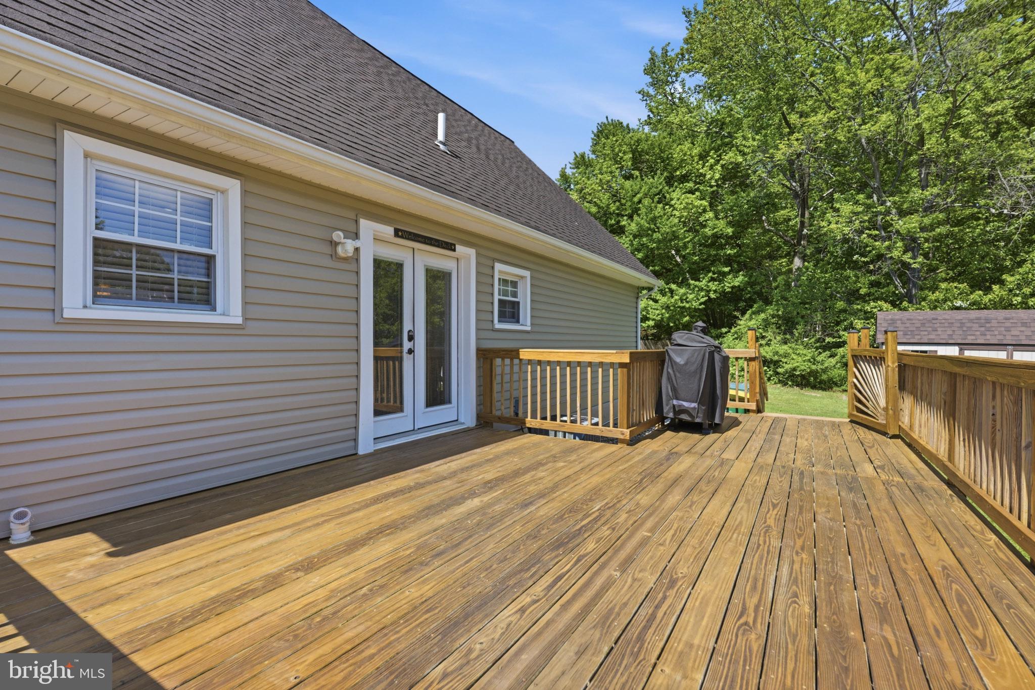 768 Salem Church Road Newark, DE 19702 - Photo 6 of 42 Sunny deck with serene woodland views.
