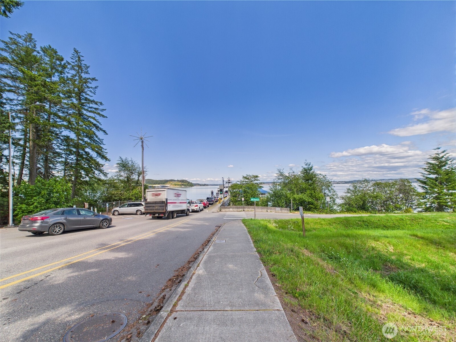 10412 Edgewood Drive Anderson Island, WA 98303 - Photo 11 of 16 a view of a street with cars on road