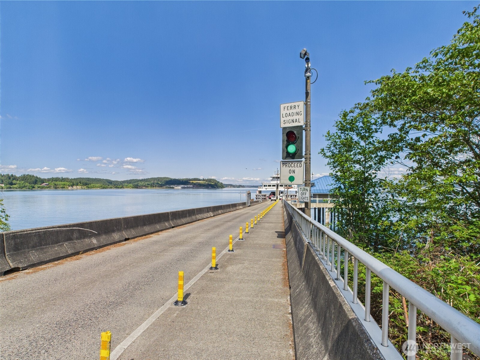10412 Edgewood Drive Anderson Island, WA 98303 - Photo 12 of 16 a view of a city from a balcony