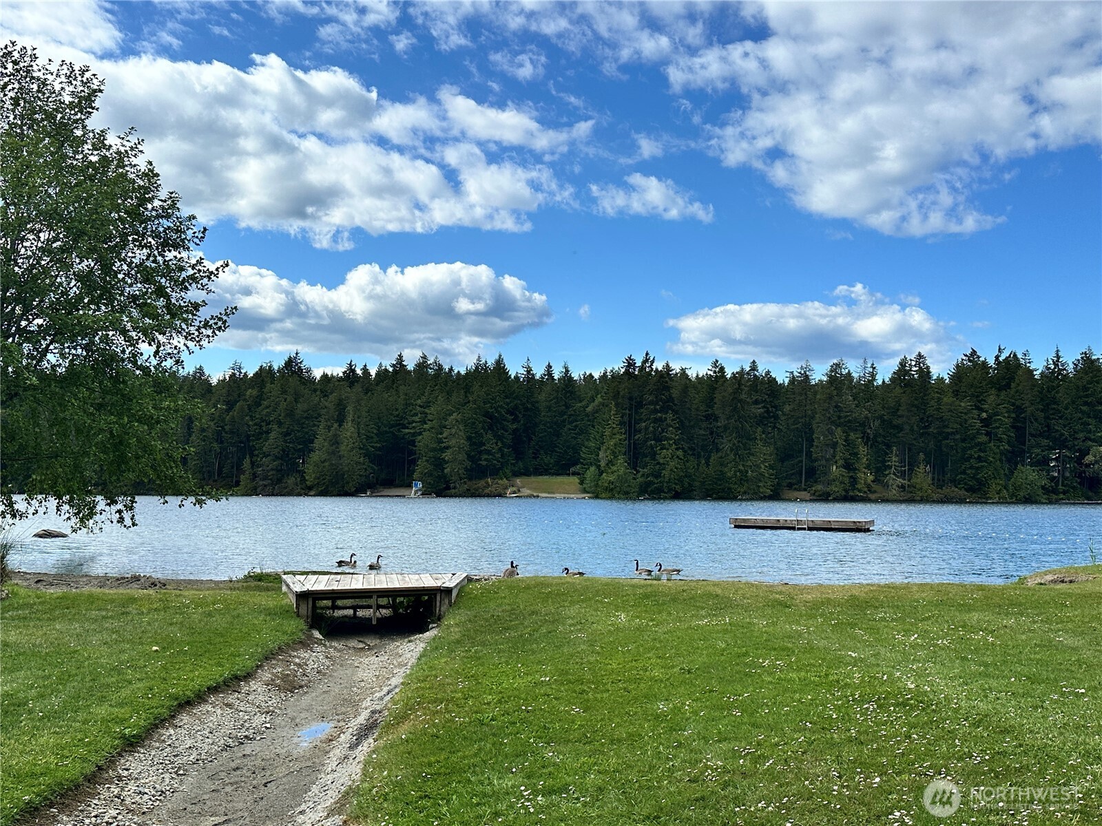 10412 Edgewood Drive Anderson Island, WA 98303 - Photo 6 of 16 a view of outdoor space with garden and seating