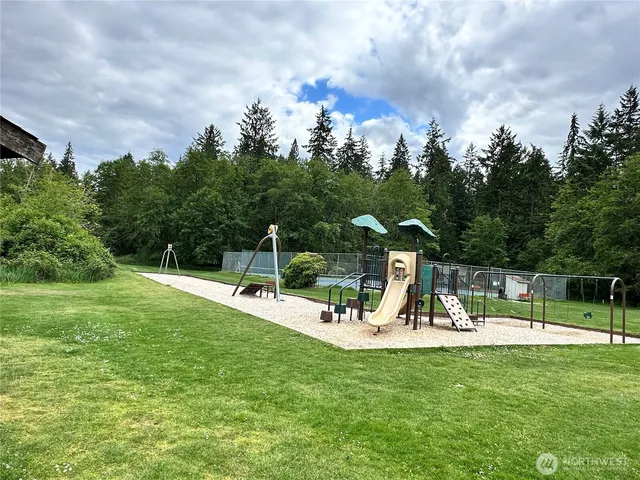 a view of a park with swings
