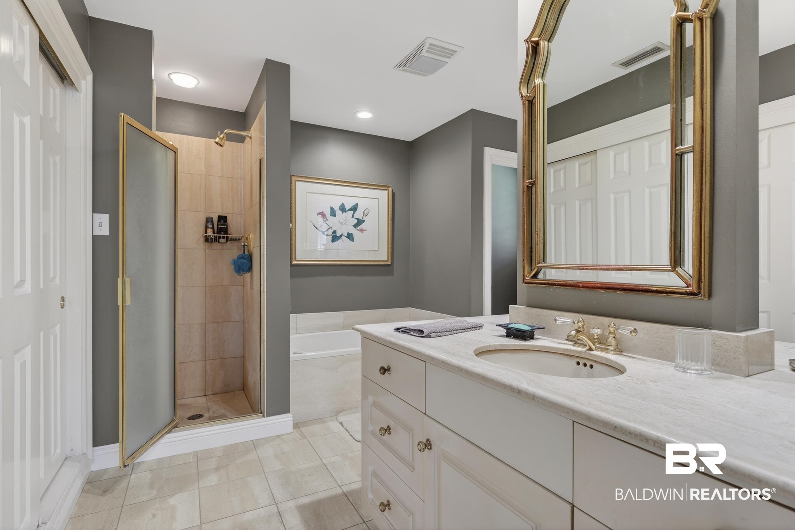 3175 Dawes Lake Road Mobile, AL 36619 - Photo 16 of 92 Full bathroom featuring a stall shower, vanity, a garden tub, and light tile patterned floors