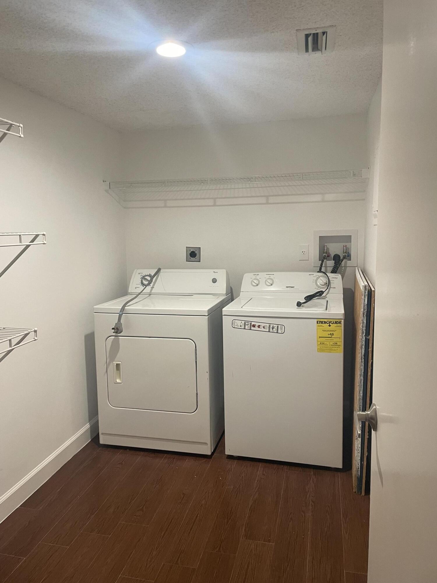 18258 Covina Way, Unit 102 Boca Raton, FL 33498 - Photo 13 of 14 a utility room with dryer and washer