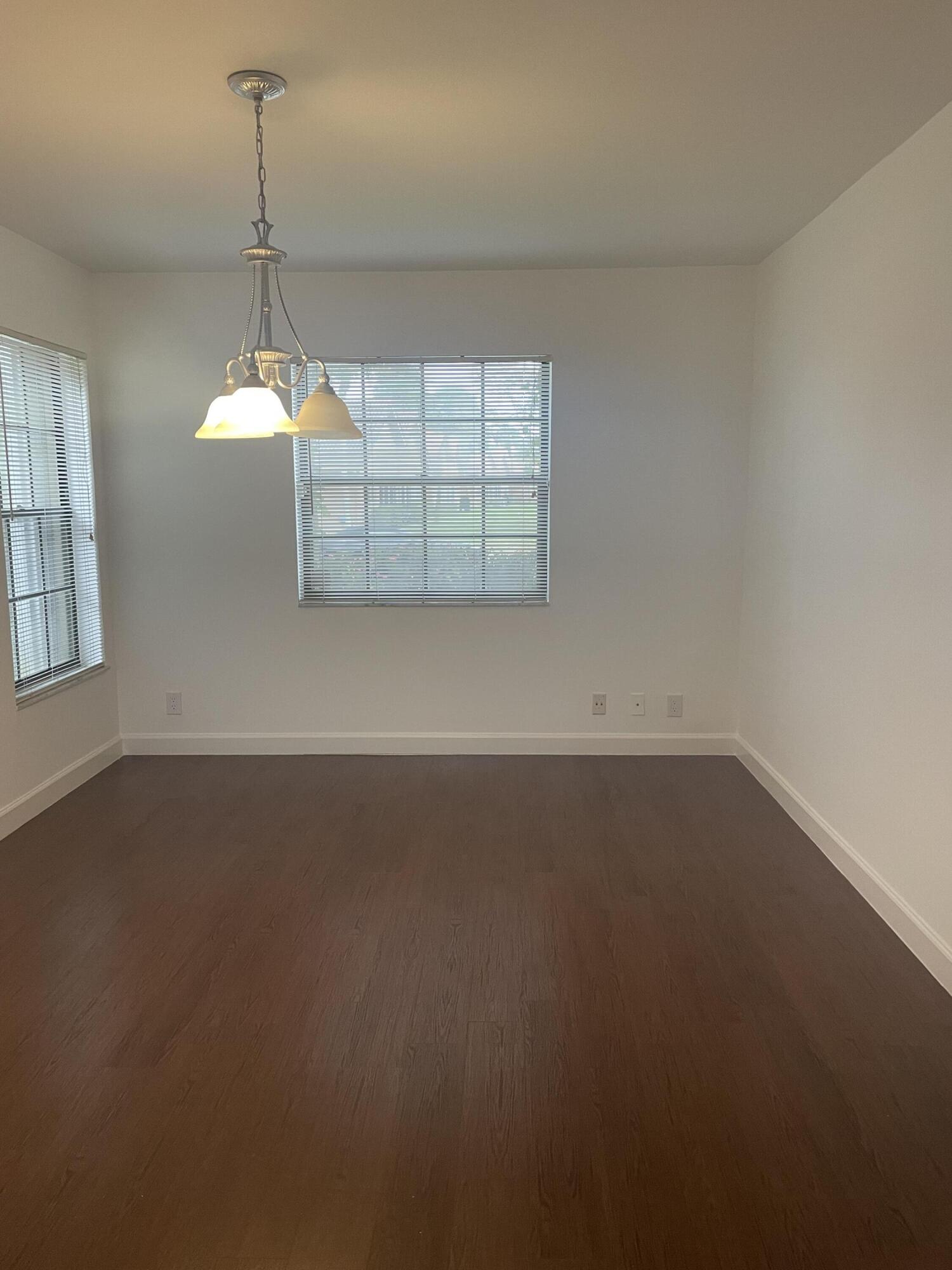 18258 Covina Way, Unit 102 Boca Raton, FL 33498 - Photo 4 of 14 an empty room with a window