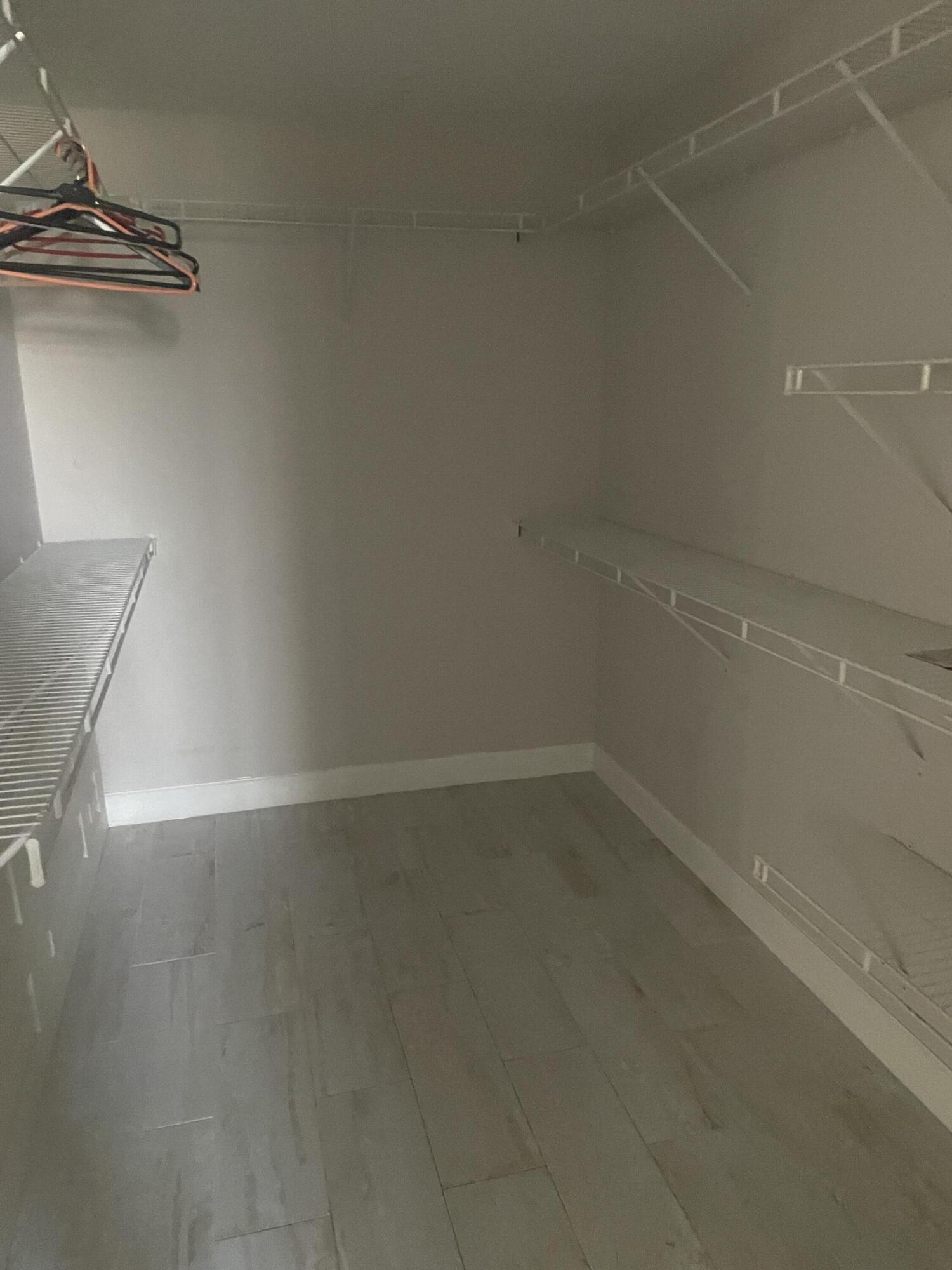 18258 Covina Way, Unit 102 Boca Raton, FL 33498 - Photo 10 of 14 a empty room with a empty space