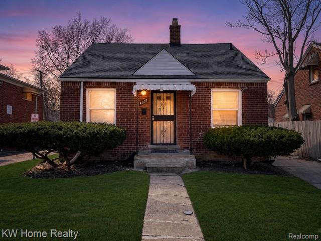 4607 Cadieux Road Detroit, MI 48224 - Photo 17 of 18 Bungalow-style home featuring a chimney, brick siding, and roof with shingles
