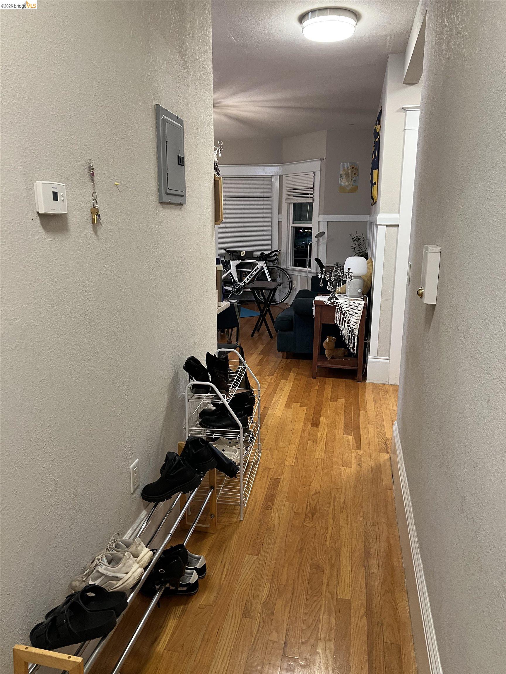 2214 Durant Avenue, Unit 5 Berkeley, CA 94704 - Photo 4 of 8 a room with gym equipment and wooden floor