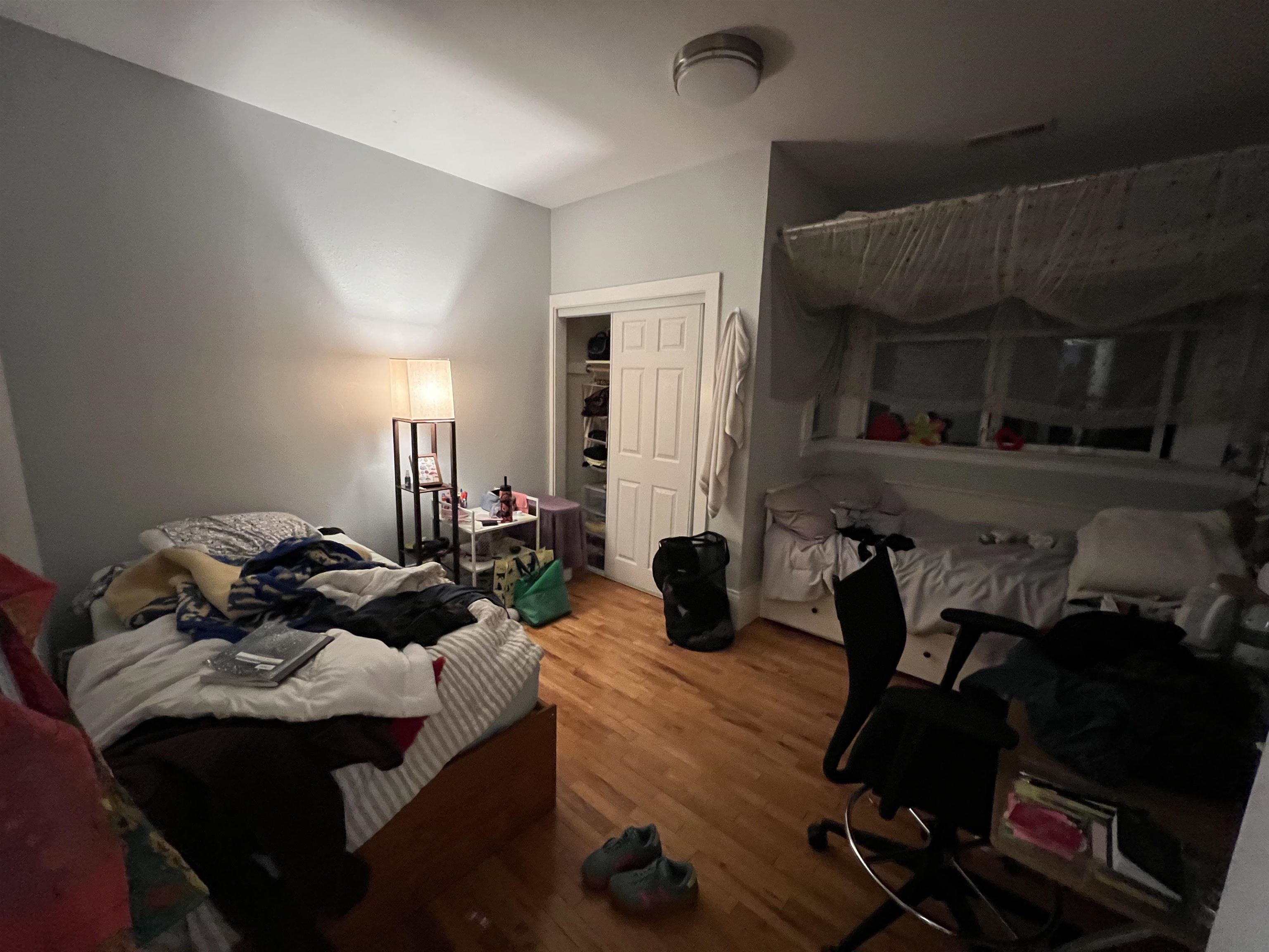 2214 Durant Avenue, Unit 5 Berkeley, CA 94704 - Photo 6 of 8 Bedroom with wood finished floors and a closet