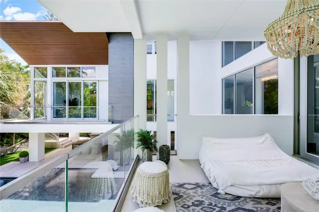 a outdoor dining space with furniture and garden view