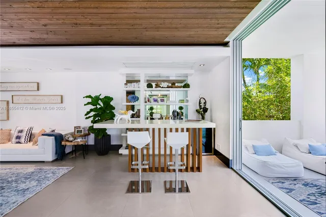 a front view of a building with a yard