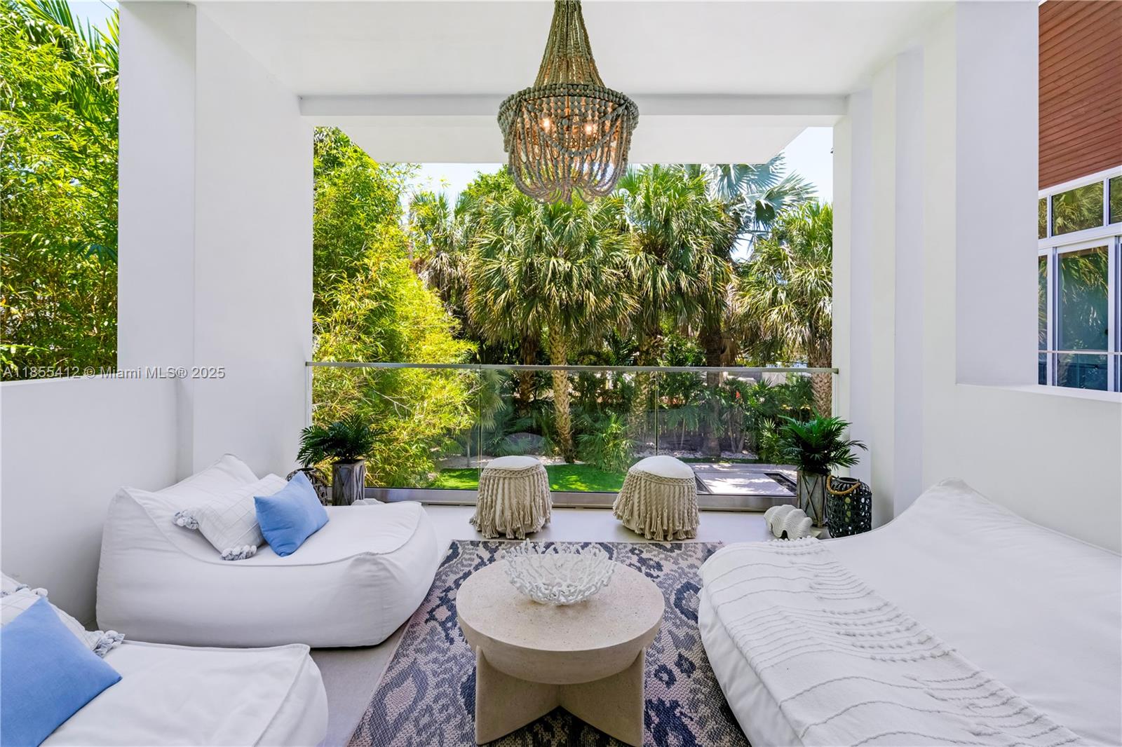 545 Sabal Palm Drive Key Biscayne, FL 33149 - Photo 29 of 100 a outdoor dining space with furniture and garden view