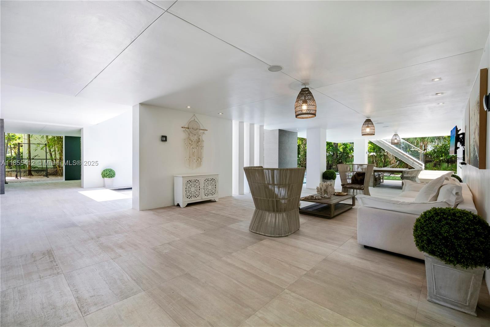 545 Sabal Palm Drive Key Biscayne, FL 33149 - Photo 41 of 100 a view of living room kitchen with furniture and outdoor view