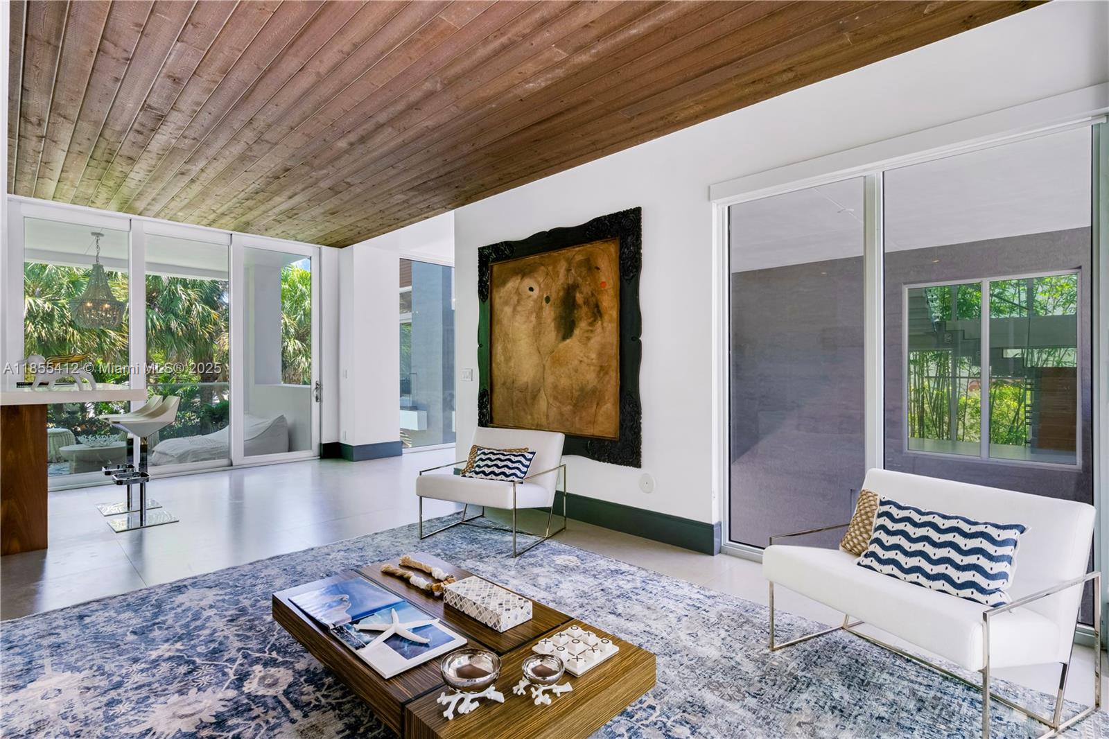 545 Sabal Palm Drive Key Biscayne, FL 33149 - Photo 81 of 100 a living room with furniture and a window