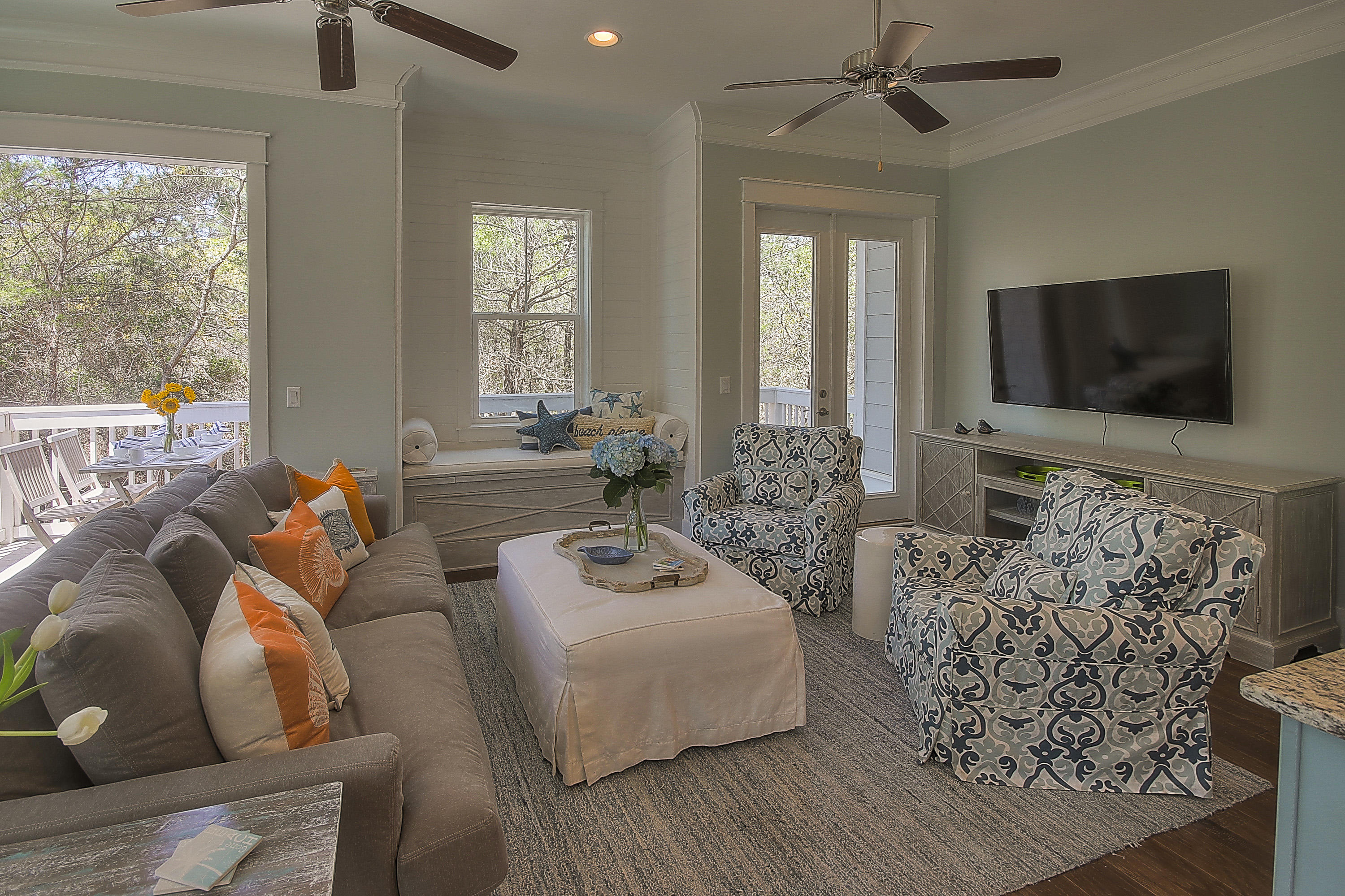 167 Milestone Drive, Unit A Inlet Beach, FL 32461 - Photo 9 of 47 a living room with furniture and a flat screen tv