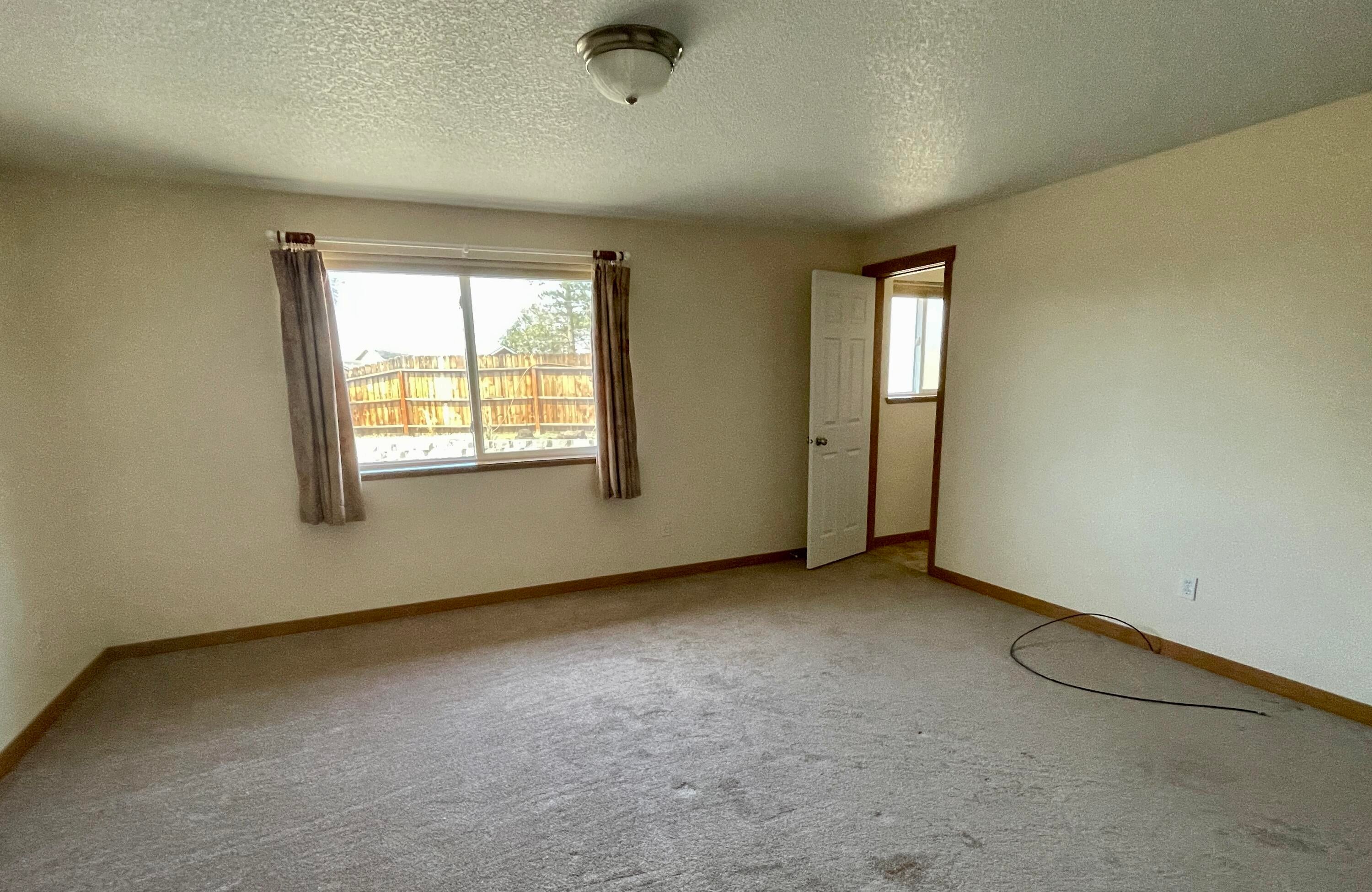 2405 Northeast Colleen Road Prineville, OR 97754 - Photo 14 of 18 has a walk in closet and it's own Bathroom.