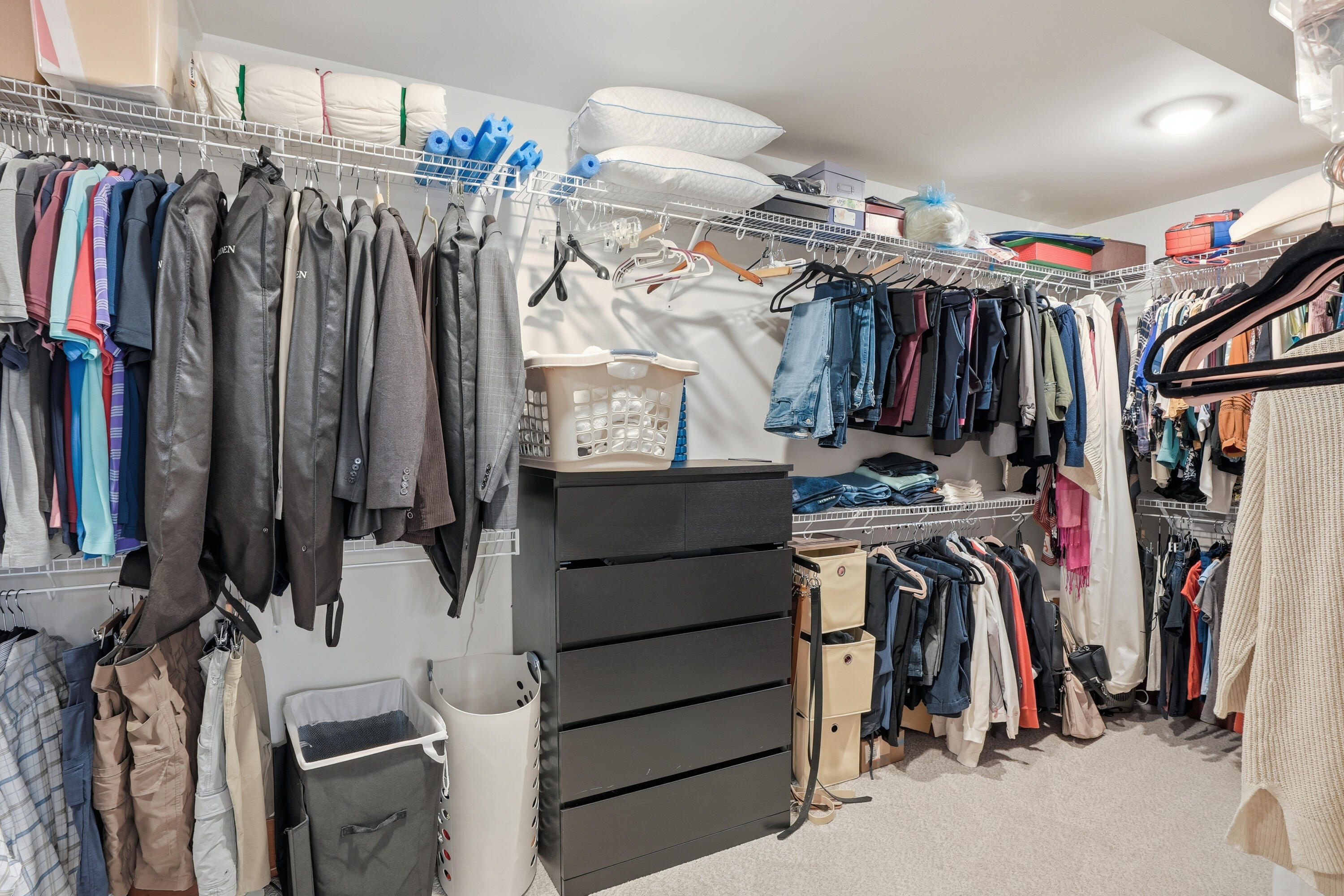 804 Shannon Drive Crown Point, IN 46307 - Photo 50 of 79 a view of walk in closet with clothes and shoes