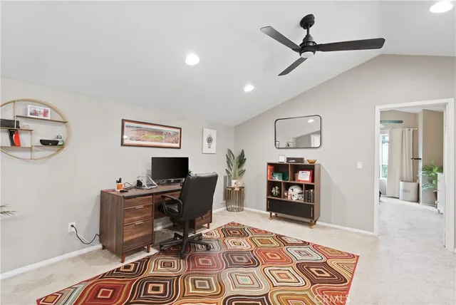 a workspace with furniture and window